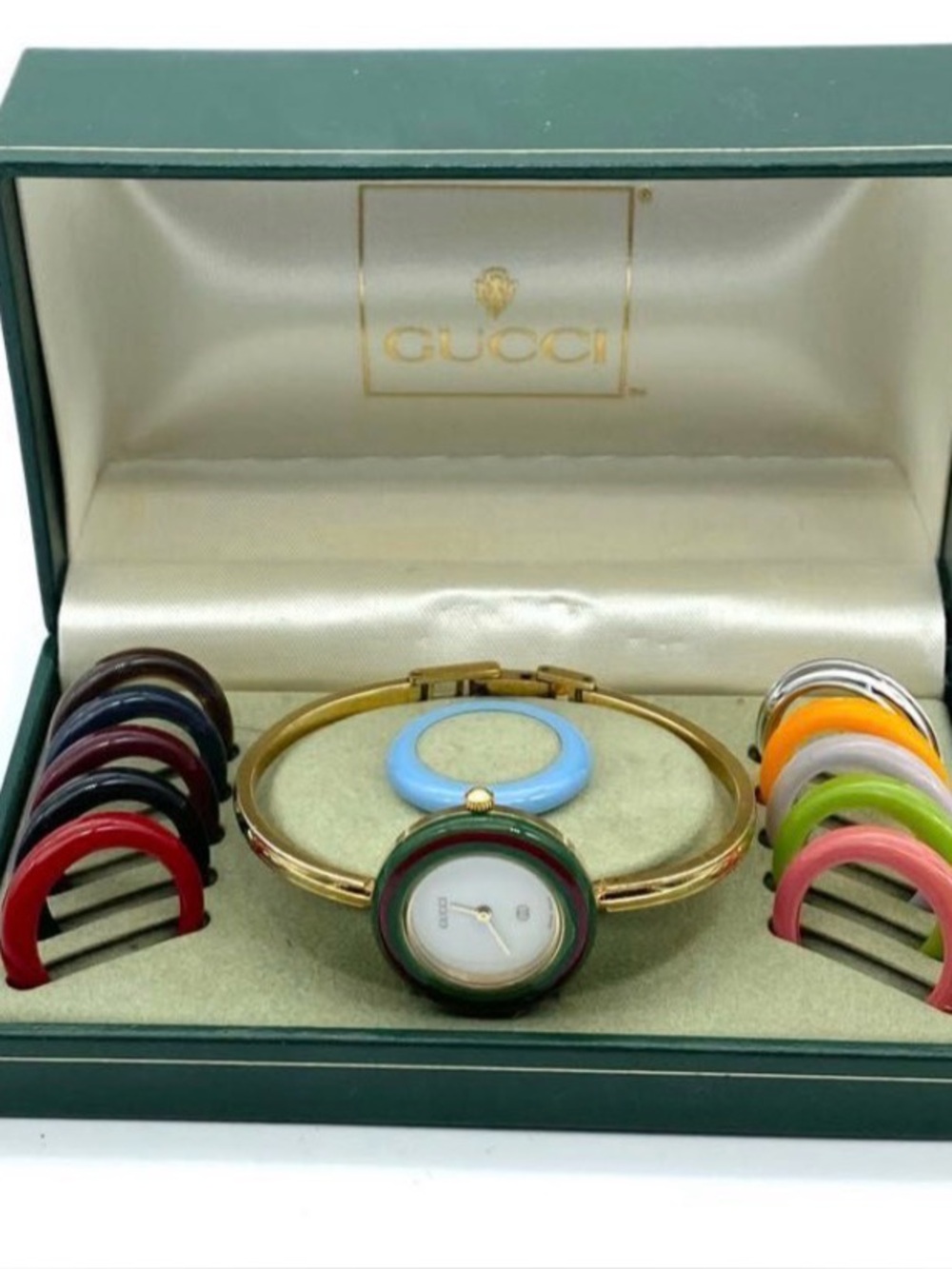 Gucci Gold Bangle Watch with Interchangeable Multicolor Bezels